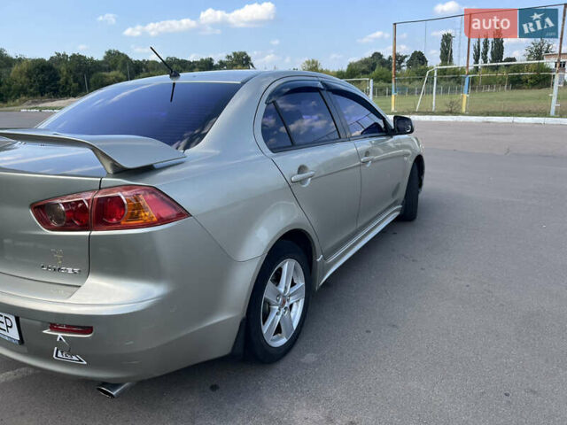 Бежевий Міцубісі Lancer, об'ємом двигуна 2 л та пробігом 330 тис. км за 5400 $, фото 4 на Automoto.ua
