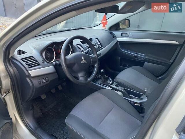 Бежевый Мицубиси Лансер, объемом двигателя 1.5 л и пробегом 242 тыс. км за 5999 $, фото 23 на Automoto.ua