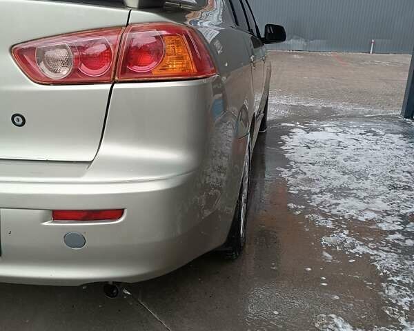 Бежевий Міцубісі Lancer, об'ємом двигуна 2 л та пробігом 200 тис. км за 6500 $, фото 12 на Automoto.ua