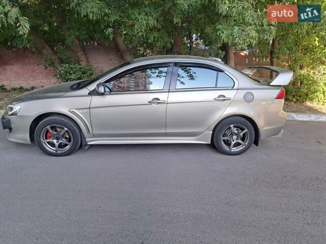 Бежевый Мицубиси Лансер, объемом двигателя 2 л и пробегом 142 тыс. км за 6300 $, фото 8 на Automoto.ua