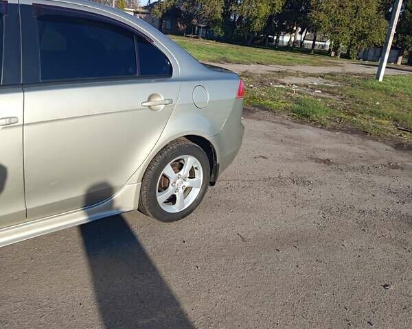 Міцубісі Lancer 2007 у Христиновке на Automoto.ua Бежевий Міцубісі Lancer, об'ємом двигуна 2 л та пробігом 141 тис. км за 6500 $, фото 13 на Automoto.ua