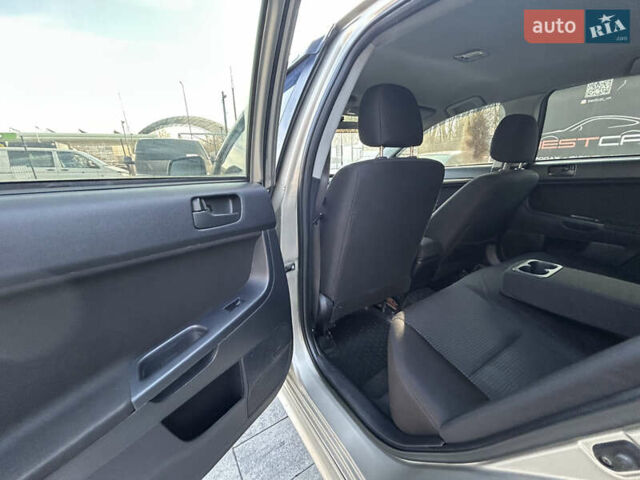 Бежевий Міцубісі Lancer, об'ємом двигуна 2 л та пробігом 250 тис. км за 8400 $, фото 20 на Automoto.ua