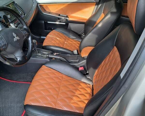 Бежевый Мицубиси Лансер, объемом двигателя 2 л и пробегом 142 тыс. км за 6300 $, фото 4 на Automoto.ua