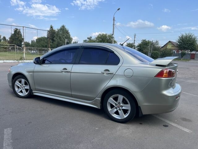 Бежевий Міцубісі Lancer, об'ємом двигуна 2 л та пробігом 300 тис. км за 5400 $, фото 2 на Automoto.ua