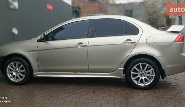 Бежевий Міцубісі Lancer, об'ємом двигуна 2 л та пробігом 200 тис. км за 6500 $, фото 5 на Automoto.ua
