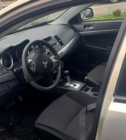 Бежевий Міцубісі Lancer, об'ємом двигуна 2 л та пробігом 114 тис. км за 6500 $, фото 2 на Automoto.ua