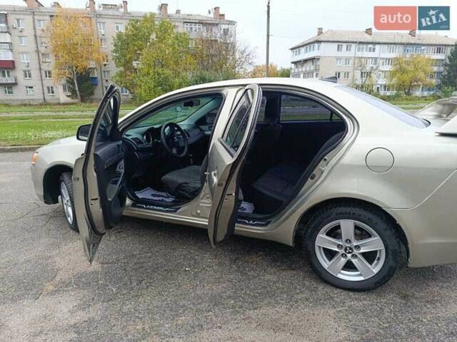Бежевый Мицубиси Лансер, объемом двигателя 1.5 л и пробегом 326 тыс. км за 5500 $, фото 16 на Automoto.ua