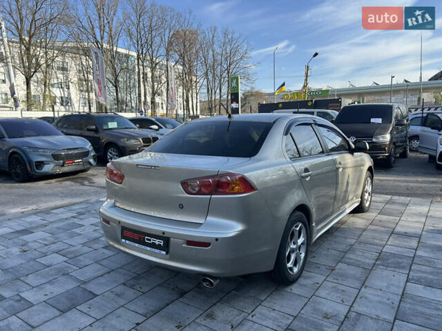 Бежевий Міцубісі Lancer, об'ємом двигуна 2 л та пробігом 250 тис. км за 8400 $, фото 8 на Automoto.ua