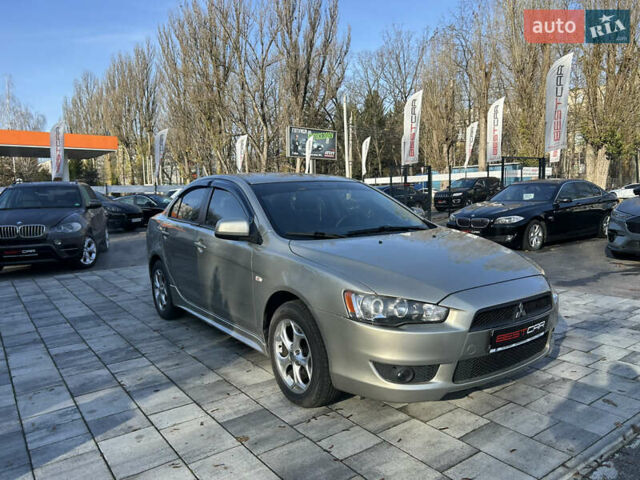 Бежевий Міцубісі Lancer, об'ємом двигуна 2 л та пробігом 250 тис. км за 8400 $, фото 6 на Automoto.ua