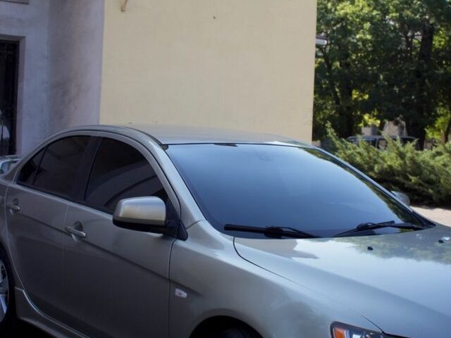 Бежевий Міцубісі Lancer, об'ємом двигуна 2 л та пробігом 220 тис. км за 7900 $, фото 3 на Automoto.ua