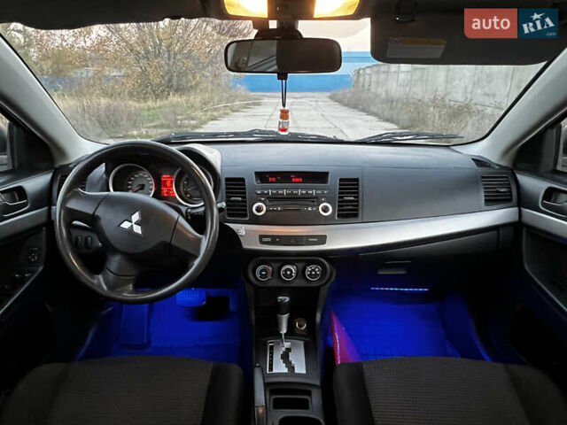 Бежевий Міцубісі Lancer, об'ємом двигуна 1.5 л та пробігом 206 тис. км за 5989 $, фото 1 на Automoto.ua