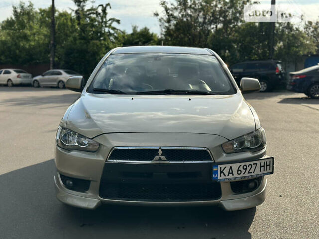 Бежевий Міцубісі Lancer, об'ємом двигуна 2 л та пробігом 205 тис. км за 5500 $, фото 1 на Automoto.ua