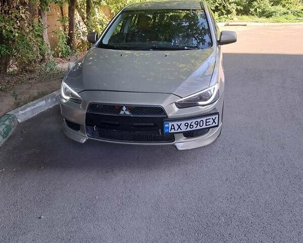 Бежевый Мицубиси Лансер, объемом двигателя 2 л и пробегом 142 тыс. км за 6300 $, фото 10 на Automoto.ua