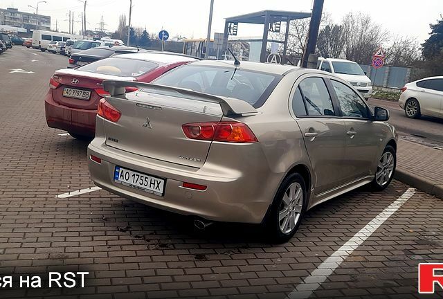 Бежевий Міцубісі Lancer, об'ємом двигуна 2 л та пробігом 114 тис. км за 6500 $, фото 1 на Automoto.ua