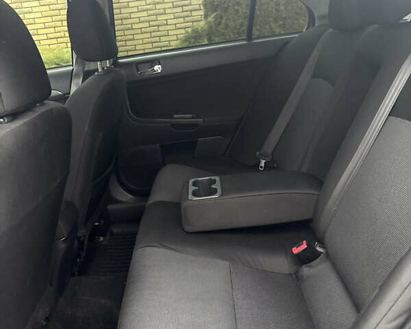 Бежевый Мицубиси Лансер, объемом двигателя 2 л и пробегом 250 тыс. км за 6400 $, фото 8 на Automoto.ua