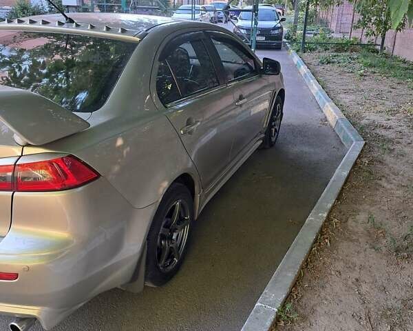 Бежевый Мицубиси Лансер, объемом двигателя 2 л и пробегом 142 тыс. км за 6300 $, фото 6 на Automoto.ua