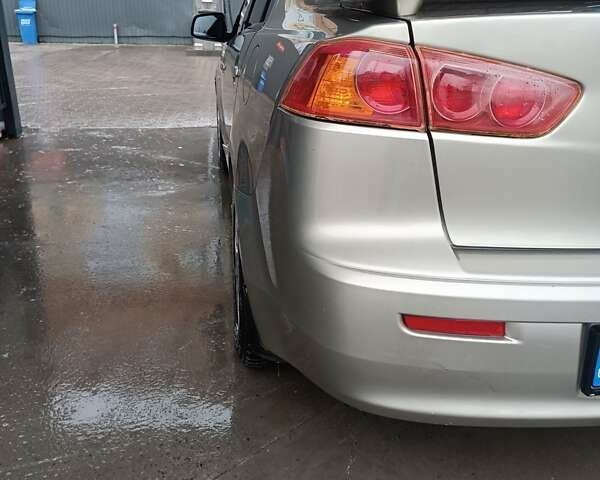 Бежевий Міцубісі Lancer, об'ємом двигуна 2 л та пробігом 200 тис. км за 6500 $, фото 10 на Automoto.ua