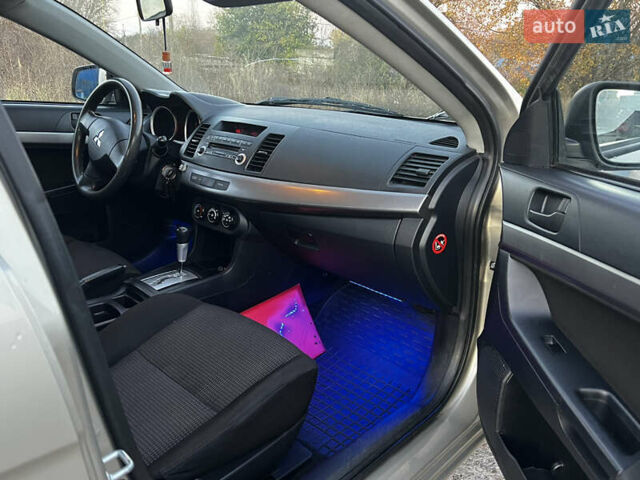 Бежевий Міцубісі Lancer, об'ємом двигуна 1.5 л та пробігом 206 тис. км за 5989 $, фото 7 на Automoto.ua