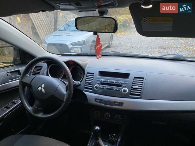 Бежевый Мицубиси Лансер, объемом двигателя 1.5 л и пробегом 242 тыс. км за 5999 $, фото 26 на Automoto.ua