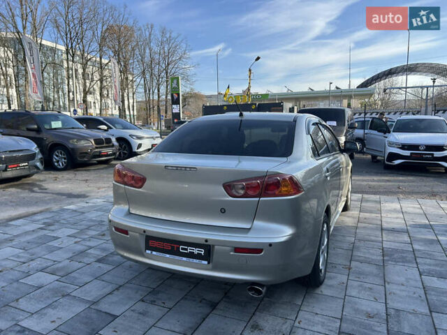 Бежевий Міцубісі Lancer, об'ємом двигуна 2 л та пробігом 250 тис. км за 8400 $, фото 10 на Automoto.ua