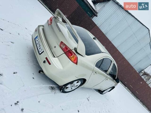 Бежевый Мицубиси Лансер, объемом двигателя 1.5 л и пробегом 380 тыс. км за 5000 $, фото 5 на Automoto.ua