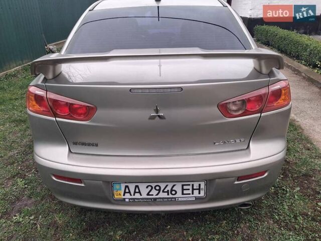 Бежевий Міцубісі Lancer, об'ємом двигуна 2 л та пробігом 160 тис. км за 7500 $, фото 1 на Automoto.ua