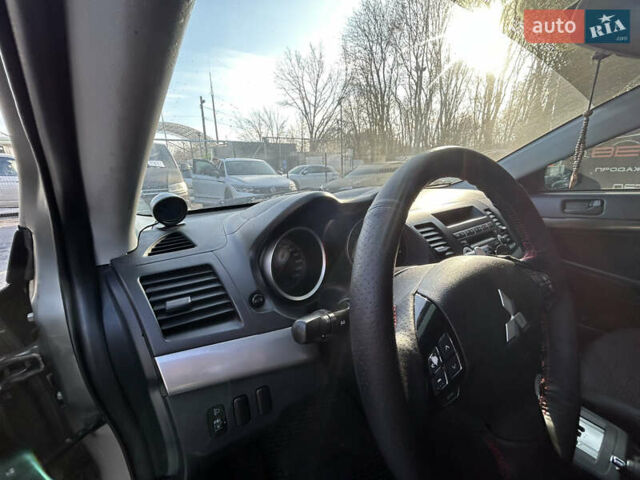 Бежевий Міцубісі Lancer, об'ємом двигуна 2 л та пробігом 250 тис. км за 8400 $, фото 19 на Automoto.ua