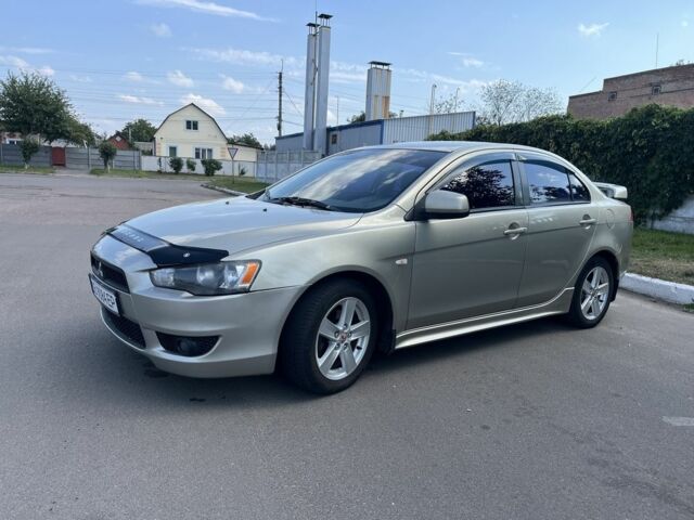 Бежевий Міцубісі Lancer, об'ємом двигуна 2 л та пробігом 300 тис. км за 5400 $, фото 1 на Automoto.ua