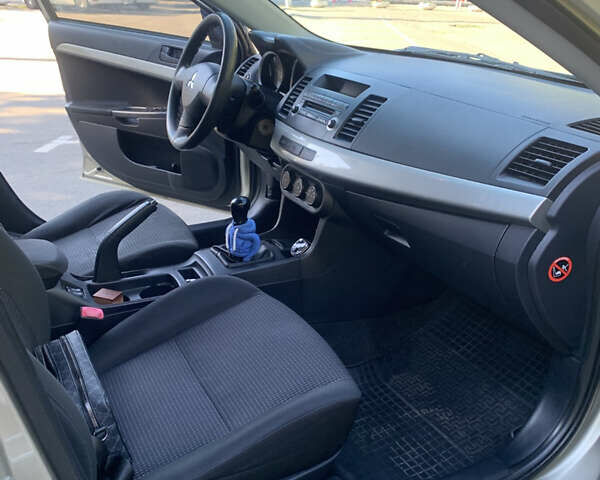 Бежевий Міцубісі Lancer, об'ємом двигуна 1.5 л та пробігом 225 тис. км за 5700 $, фото 8 на Automoto.ua