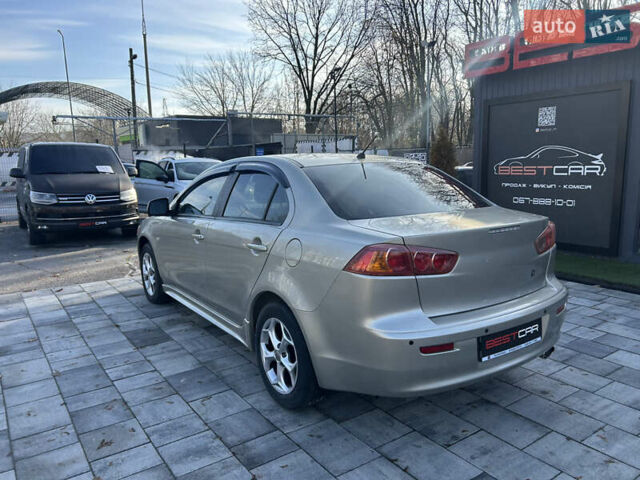 Бежевий Міцубісі Lancer, об'ємом двигуна 2 л та пробігом 250 тис. км за 8400 $, фото 12 на Automoto.ua