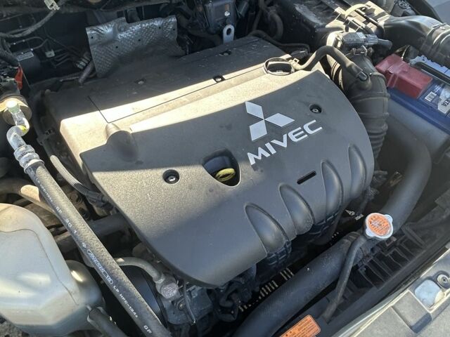 Бежевий Міцубісі Lancer, об'ємом двигуна 2 л та пробігом 138 тис. км за 7500 $, фото 7 на Automoto.ua
