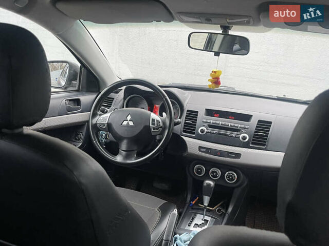Бежевый Мицубиси Лансер, объемом двигателя 2 л и пробегом 230 тыс. км за 5599 $, фото 6 на Automoto.ua