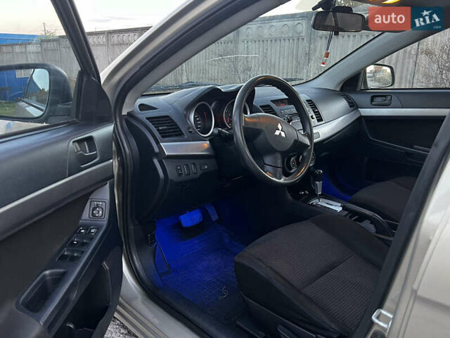 Бежевий Міцубісі Lancer, об'ємом двигуна 1.5 л та пробігом 206 тис. км за 5989 $, фото 5 на Automoto.ua