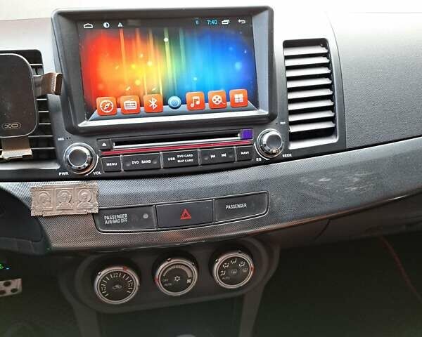 Бежевый Мицубиси Лансер, объемом двигателя 2 л и пробегом 142 тыс. км за 6300 $, фото 13 на Automoto.ua