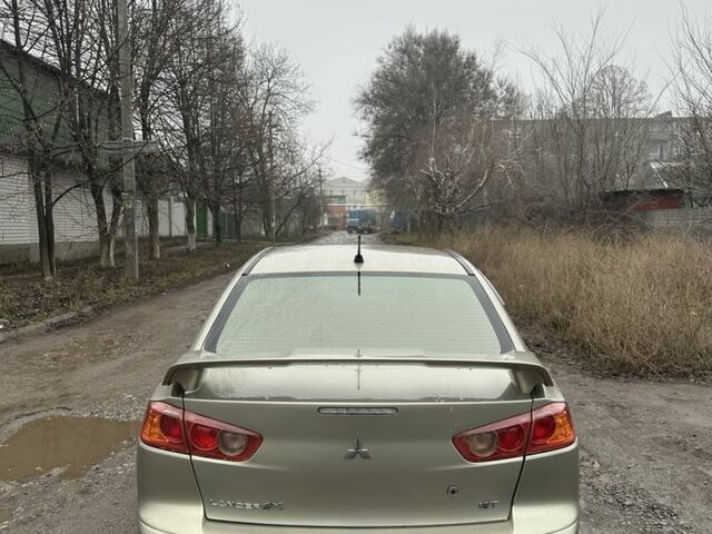 Бежевый Мицубиси Лансер, объемом двигателя 2 л и пробегом 270 тыс. км за 4950 $, фото 3 на Automoto.ua