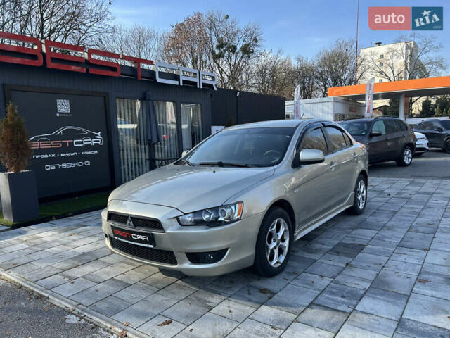 Бежевий Міцубісі Lancer, об'ємом двигуна 2 л та пробігом 250 тис. км за 8400 $, фото 1 на Automoto.ua