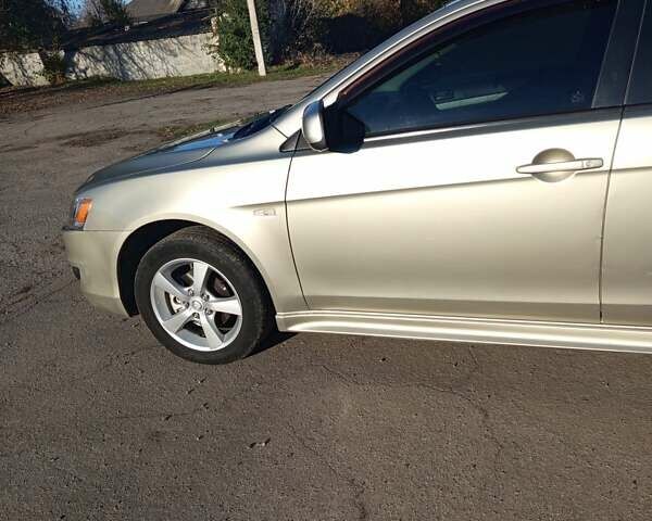 Міцубісі Lancer 2007 у Христиновке на Automoto.ua Бежевий Міцубісі Lancer, об'ємом двигуна 2 л та пробігом 141 тис. км за 6500 $, фото 24 на Automoto.ua