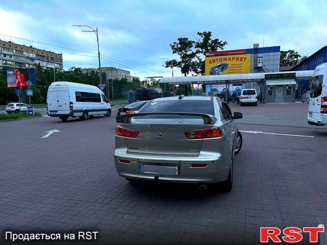 Бежевый Мицубиси Лансер, объемом двигателя 2 л и пробегом 270 тыс. км за 6800 $, фото 4 на Automoto.ua