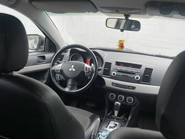 Бежевый Мицубиси Лансер, объемом двигателя 2 л и пробегом 230 тыс. км за 5799 $, фото 3 на Automoto.ua