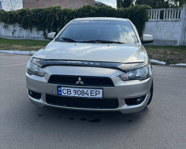 Бежевий Міцубісі Lancer, об'ємом двигуна 2 л та пробігом 330 тис. км за 5400 $, фото 1 на Automoto.ua