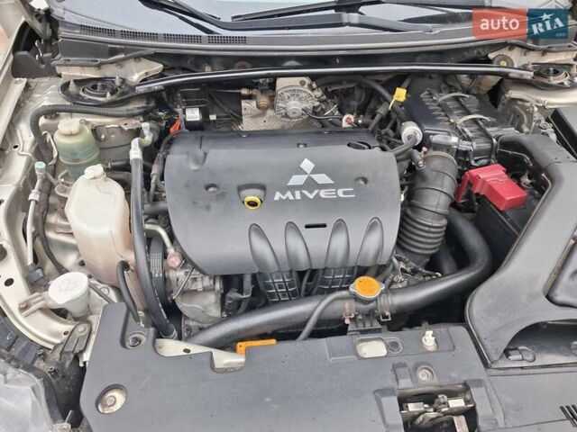 Бежевий Міцубісі Lancer, об'ємом двигуна 2 л та пробігом 160 тис. км за 7500 $, фото 6 на Automoto.ua