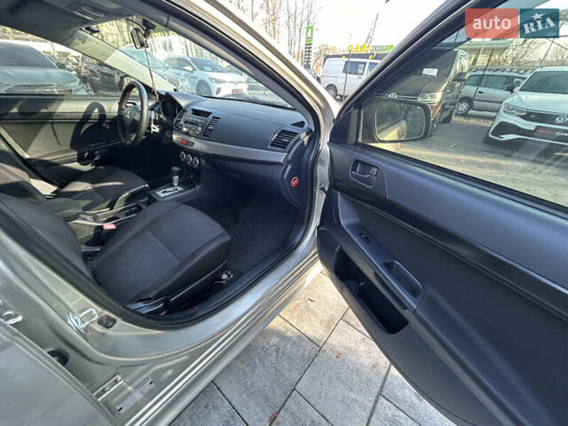 Бежевий Міцубісі Lancer, об'ємом двигуна 2 л та пробігом 250 тис. км за 8400 $, фото 26 на Automoto.ua