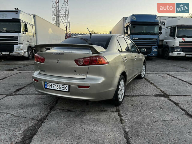Бежевий Міцубісі Lancer, об'ємом двигуна 1.5 л та пробігом 206 тис. км за 5989 $, фото 3 на Automoto.ua