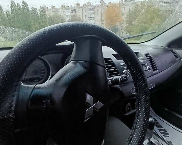 Бежевый Мицубиси Лансер, объемом двигателя 1.5 л и пробегом 326 тыс. км за 5500 $, фото 19 на Automoto.ua