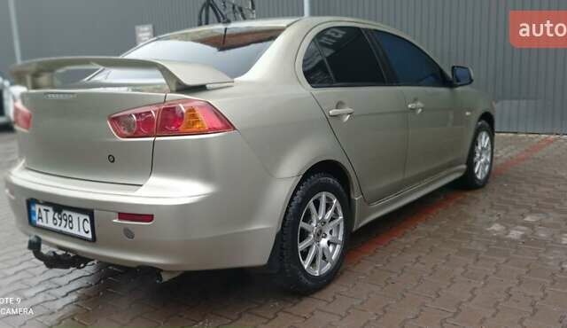 Бежевий Міцубісі Lancer, об'ємом двигуна 2 л та пробігом 200 тис. км за 6500 $, фото 7 на Automoto.ua