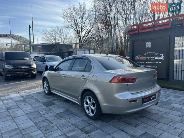 Бежевий Міцубісі Lancer, об'ємом двигуна 2 л та пробігом 250 тис. км за 8400 $, фото 13 на Automoto.ua