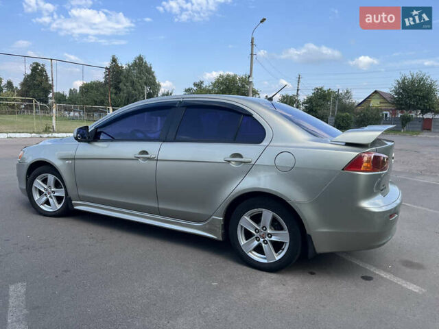 Бежевий Міцубісі Lancer, об'ємом двигуна 2 л та пробігом 330 тис. км за 5400 $, фото 2 на Automoto.ua