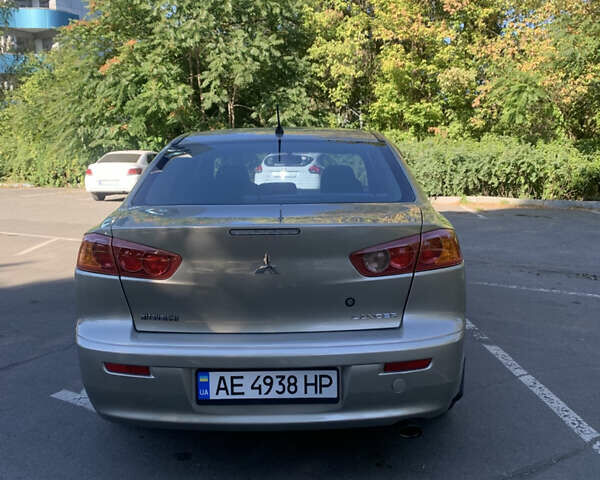 Бежевий Міцубісі Lancer, об'ємом двигуна 1.5 л та пробігом 225 тис. км за 5700 $, фото 4 на Automoto.ua