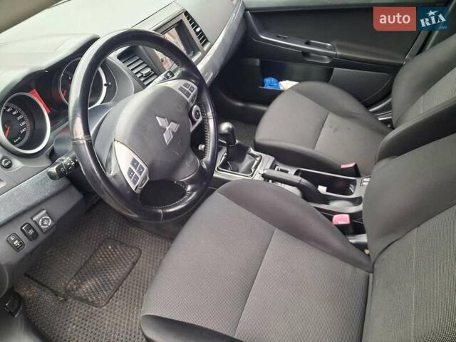 Бежевий Міцубісі Lancer, об'ємом двигуна 2 л та пробігом 160 тис. км за 7500 $, фото 4 на Automoto.ua