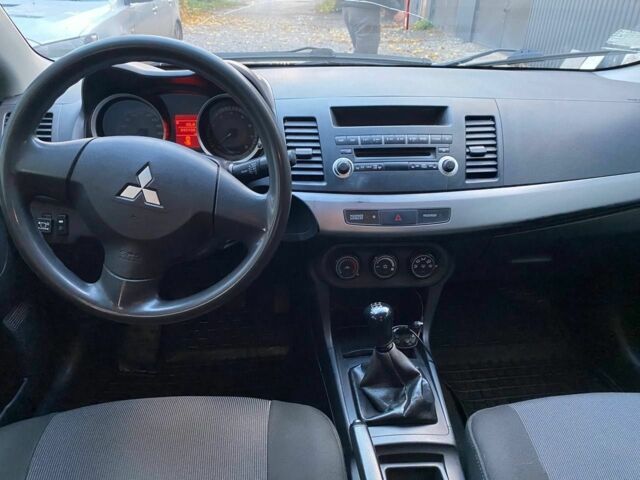 Бежевый Мицубиси Лансер, объемом двигателя 1.5 л и пробегом 242 тыс. км за 5999 $, фото 6 на Automoto.ua